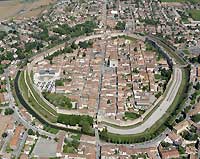 Veduta aerea di Cittadella + scritta 'Zitac spa è una società di trasformazione urbana (Stu) nata su iniziativa del Comune di Cittadella al fine di realizzare e gestire due aree produttive per complessivi 674.000 mq'